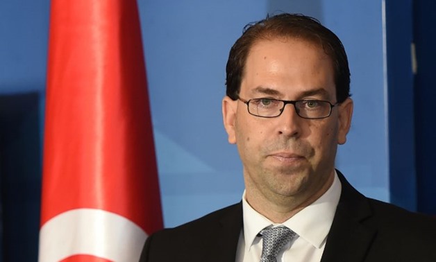 Tunisia prime minister-delegate Youssef Chahed speaks to the press after being appointed by the Tunisian president at Carthage Palace in Carthage on Aug 3 – AFP