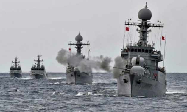 South Korean Defence Ministry/AFP / by Carole LANDRY, with Dave Clark in Washington | South Korean naval vessels, seen here on September 5, and the Chinese air force are conducting drills amid high tension surrounding the North Korea nuclear standoff
