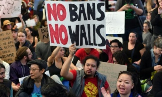  AFP/| Protesters demonstrate at San Francisco International Airport in California, in January 2017
