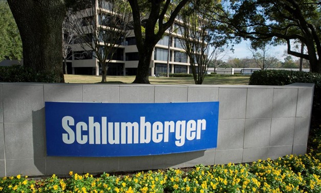 FILE PHOTO: The exterior of a Schlumberger Corporation building is pictured in West Houston, Texas, U.S. on January 16, 2015. REUTERS/Richard Carson/File Photo