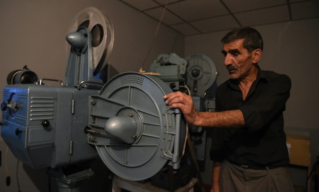 The Taliban, who banned popular entertainment including cinema and music during their brutal 1996-2001, raided Afghanistan's state-run film company and burned several movie reels -- but thousands more were hidden and are now being digitised-AFP / SHAH MAR