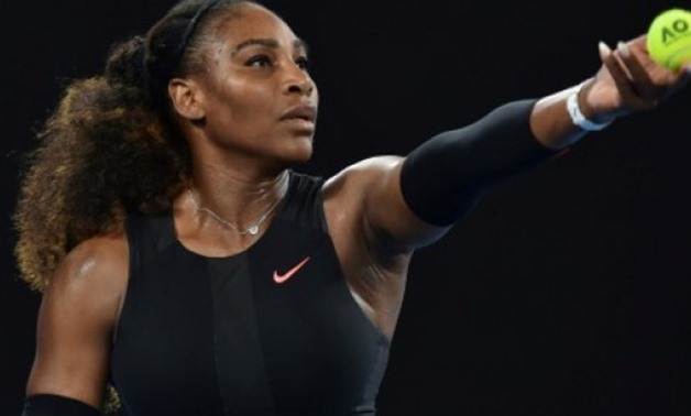 © AFP/File | Serena Williams of the US serves against Czech Republic's Lucie Safarova during their women's singles second round match on day four of the Australian Open tennis tournament in Melbourne January 19, 2017