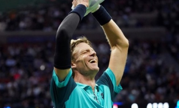© AFP / by Dave JAMES | South Africa's Kevin Anderson celebrates after defeating Spain's Pablo Carreno Busta during their 2017 US Open Men's Single Semifinals match in New York
