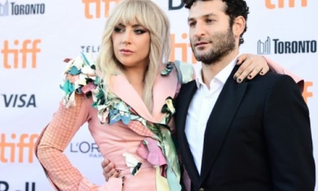 © GETTY IMAGES NORTH AMERICA/AFP / by Michel COMTE | Lady Gaga and Chris Moukarbel attend The World Premiere of "Gaga: Five Foot Two" during The Toronto International Film Festival