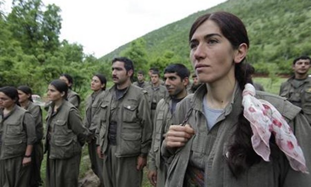 Kurdistan Workers Party (PKK) fighters stand in formation in northern Iraq May 14, 2013. REUTERS/Azad Lashkari