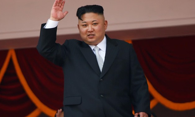 FILE PHOTO: North Korean leader Kim Jong Un waves to people attending a military parade marking the 105th birth anniversary of country's founding father, Kim Il Sung in Pyongyang, April 15, 2017. REUTERS/Damir Sagolj/File Photo