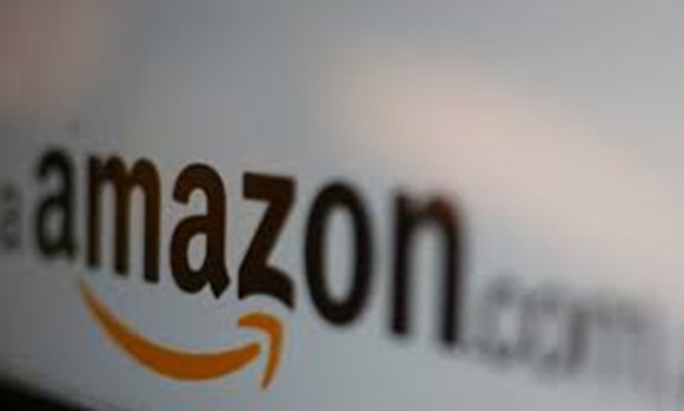 The logo of the web service Amazon is pictured in this June 8, 2017 illustration photo. REUTERS/Carlos Jasso/Illustration