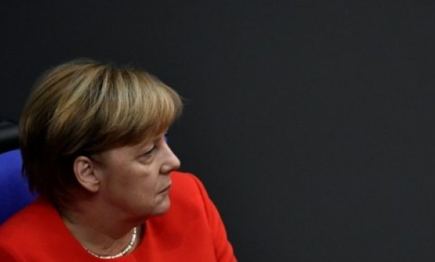 Chancellor Angela Merkel says Germany will support an effort to hold talks with North Korea along the lines of the deal done with Iran