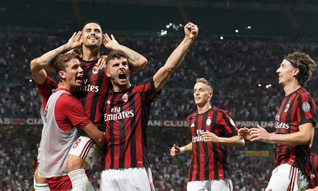 Ac Milan players celebrate a goal against Caligari, Ac Milan Twitter