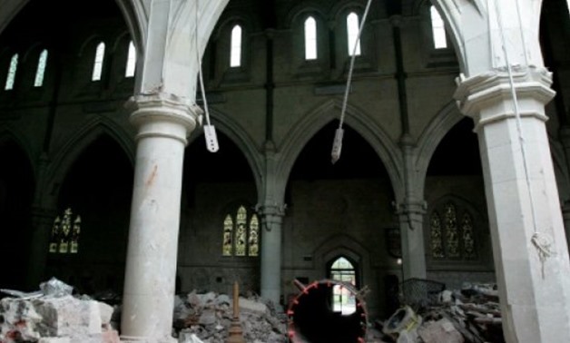 POOL/AFP/File | Much of Christchurch's late 19th Century neo-Gothic cathedral collapsed in a 6.3-magnitude quake that levelled the South Island city's downtown area in February 2011, killing 185 people
