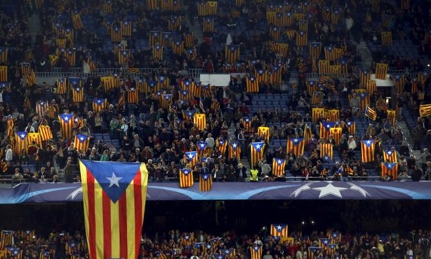 Barcelona fans with Catalonia flags - Reuters