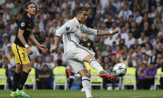 Cristiano Ronaldo and Filipe Luis - Reuters