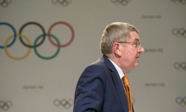 © AFP / by Rob Woollard | International Olympic Committee President Thomas Bach has defended his organisation's handling of corruption allegations