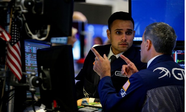 Traders work on the floor of the New York Stock Exchange (NYSE) in New York, U.S., September 8, 2017. REUTERS/Brendan McDermid