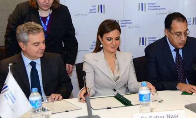  Minister of Investment Sahar Nasr during signing the agreement- Press Photo