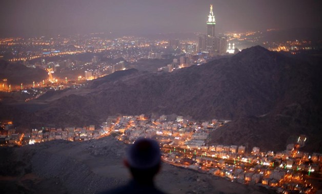 A Muslim pilgrim prays atop Mount Thor in the holy city of Mecca ahead of the annual haj pilgrimage October 11, 2013. REUTERS