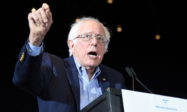 Bernie Sanders and Pennsylvanians rally to demand that Sen. Pat Toomey -AFP