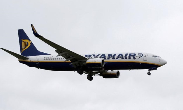 A Ryanair aircraft lands at Manchester Airport in Manchester, Britain, May 26, 2015. REUTERS