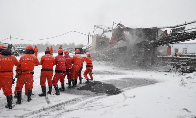 Rescuers work near the site of a coal mine disaster in Qitaihe, Heilongjiang province, China, November 30, 2016. China Daily/via REUTERS