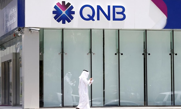 A man walks past a branch of Qatar National Bank (QNB) in Riyadh, Saudi Arabia, June 5, 2017. REUTERS/Faisal Al Nasser