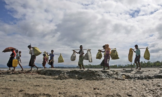 Amnesty decries burnings targeting Rohingya - Press photo