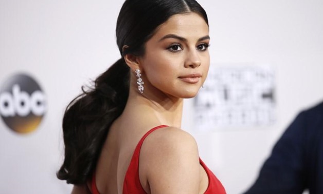 FILE PHOTO: Recording artist Selena Gomez arrives at the 2016 American Music Awards in Los Angeles, California, U.S., November 20, 2016. REUTERS/Danny Moloshok