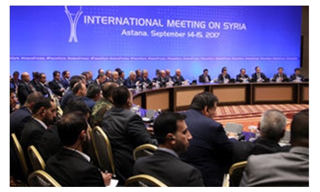 Participants attend the round of Syria peace talks in Astana - REUTERS