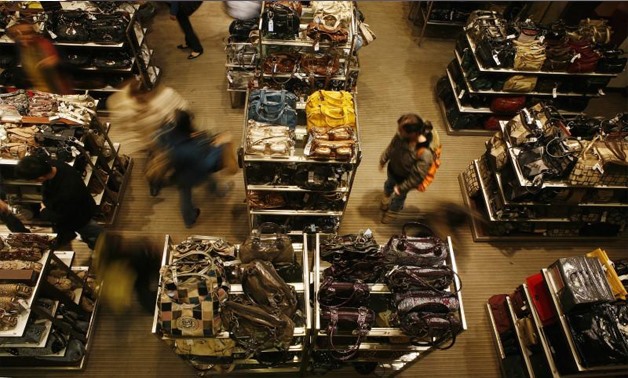 Shoppers walk through Macy's department store in New York November 20, 2007 - REUTERS/Lucas Jackson
