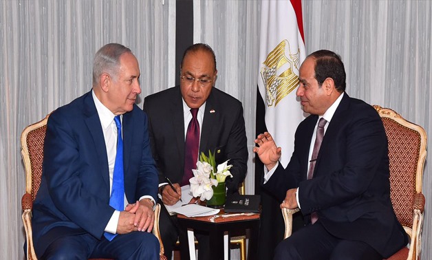 President Abdel Fatah al-Sisi talks with the Israeli Prime Minister Benyamin Netanyahu at his- Sisi’s- residence in New York - Press Photo