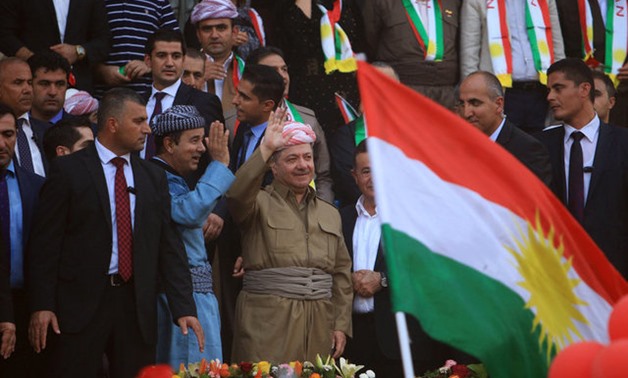 Iraqi Kurdish President Masoud Barzani salutes the crowd while attending a rally to show their support for the upcoming September 25th independence referendum in Duhuk, Iraq September 16, 2017. REUTERS/Ari Jalal

