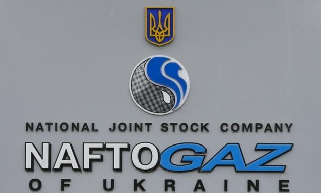 The logo of the Ukrainian national joint stock company NaftoGaz is seen outside the company's headquarters in central Kiev, Ukraine, March 15, 2016. REUTERS/Valentyn Ogirenko