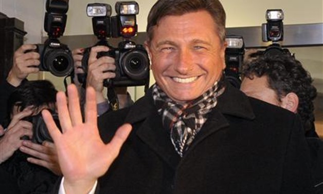 Former prime minister Borut Pahor celebrates his victory with supporters after the unofficial results were announced in the second round of Presidential elections in Ljubljana December 2, 2012. REUTERS