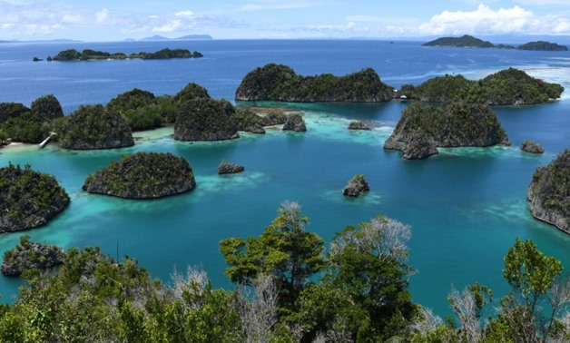 A tableau of white sandy beaches, colourful coral reefs and turquoise water, the islands of Raja Ampat are set to be Indonesia's next tourism hotspot -- but locals fear the government is failing both them and the environment in its development push-AFP / 