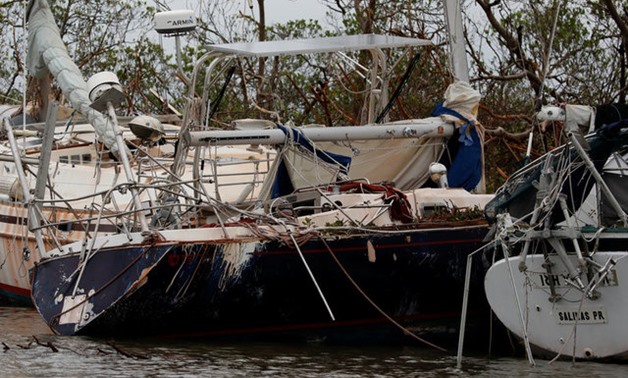 Damaged boats are seen after the area was hit by Hurricane Maria in Salinas, Puerto Rico September 21, 2017. REUTERS/Carlos Garcia Rawlins