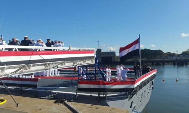 Egyptian Navy Commander Ahmed Khaled raises flag on Gowind 2500 Corvette in Lorient shipyard- press photo