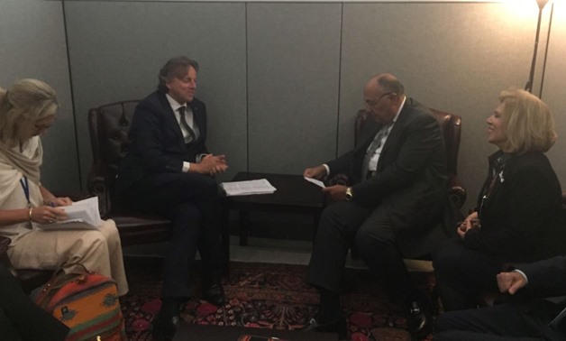 Dutch Foreign Minister Bert Koenders (L) Sameh Shoukry (C) and Moushira Khattab (R)