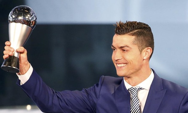 Cristiano Ronaldo with the tophy, REUTERS