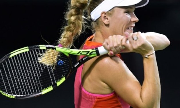 © AFP | Defending champion Caroline Wozniacki is a two-time Tokyo winner and finalist in 2014