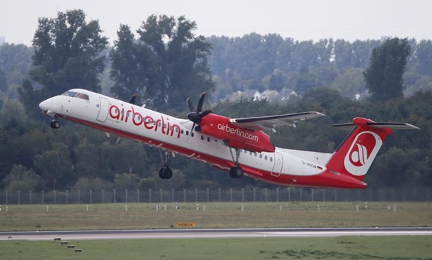 A Bombardier Dash 8 Q400 aircraft of German carrier AirBerlin takes off towards Stuttgart, Germany, from Duesseldorf airport, Germany, September 12, 2017. REUTERS/Wolfgang Rattay