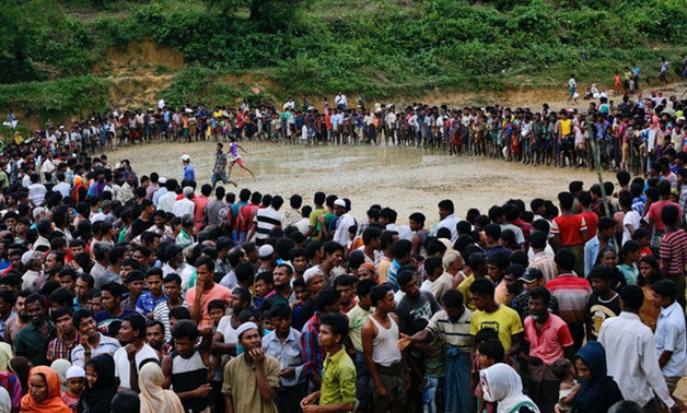 Rohingya refugees wait for aid in Cox's Bazar, Bangladesh September 20, 2017. REUTERS/Danish Siddiqui