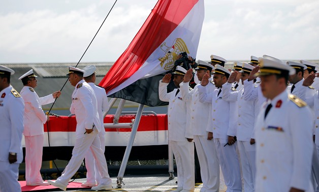Egyptian sailors attend the flag ceremony for Egyptian BPC Anwar El-Sadat in Saint-Nazaire, western France, September 16, 2016. (Reuters)
