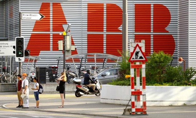 The logo of Swiss power technology and automation group ABB is seen in Baden, Switzerland June 23, 2017. REUTERS/Arnd Wiegmann/File Photo