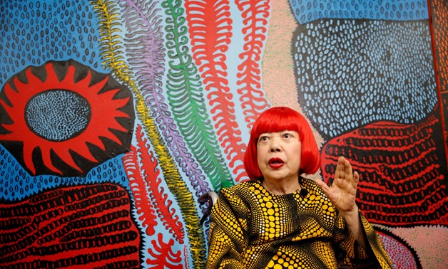 Japanese avant-garde artist Yayoi Kusama speaks to journalists at her studio in Tokyo, Japan September 26, 2017. REUTERS/Toru Hanai
