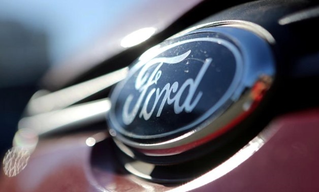 FILE PHOTO: The Ford logo is seen on a car in a park lot in Sao Paulo, Brazil June 2, 2017. REUTERS/Paulo Whitaker/File Photo