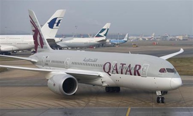 Qatar Airways new Boeing 787 Dreamliner taxis after arriving on it's inaugural flight to Heathrow Airport, west London December 13, 2012. REUTERS