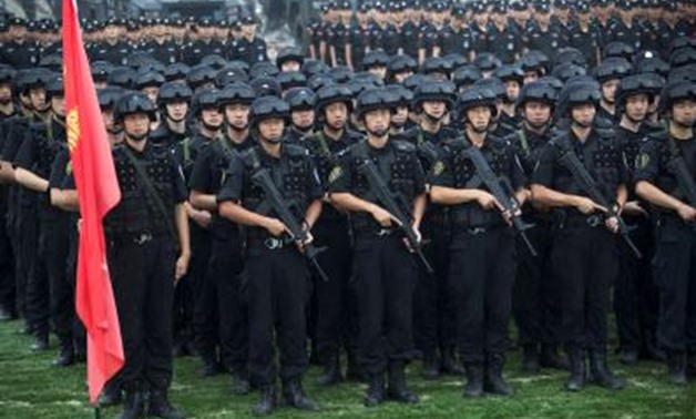 Chinese police officers take part in a security oath-taking rally for the 19th National Congress of the Communist Party, in Nanjing, Jiangsu province, China, September 27, 2017. Picture taken September 27, 2017. REUTERS/Stringer