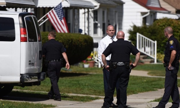 Toddler shoots two children at Michigan home - Press Photo