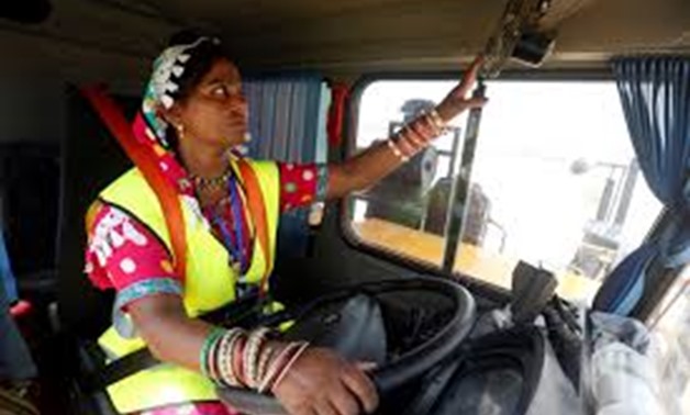 Gulaban, a 25-year old mother of three, adjusts a fan before driving a 60-tonne truck, during a training session of the Female Dump Truck Driver Programme, introduced by the Sindh Engro Coal Mining Company (SECMC), in Islamkot, Tharparkar, Pakistan Septem