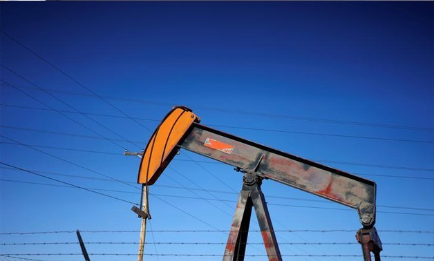 An oil well pump jack is seen at an oil field supply yard near Denver, Colorado, U.S. - REUTERS/Rick Wilking/File Photo