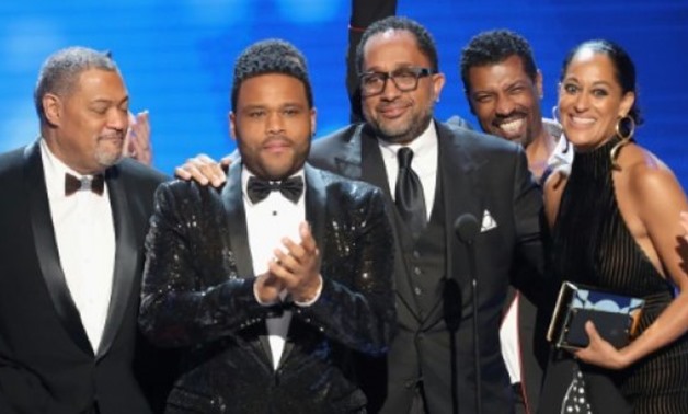 'black-ish' cast members and creators (from left) Laurence Fishburne, Anthony Anderson, Kenya Barris, Deon Cole and Tracee Ellis Ross accepting an NAACP Image award for best comedy early this year in Pasadena, California